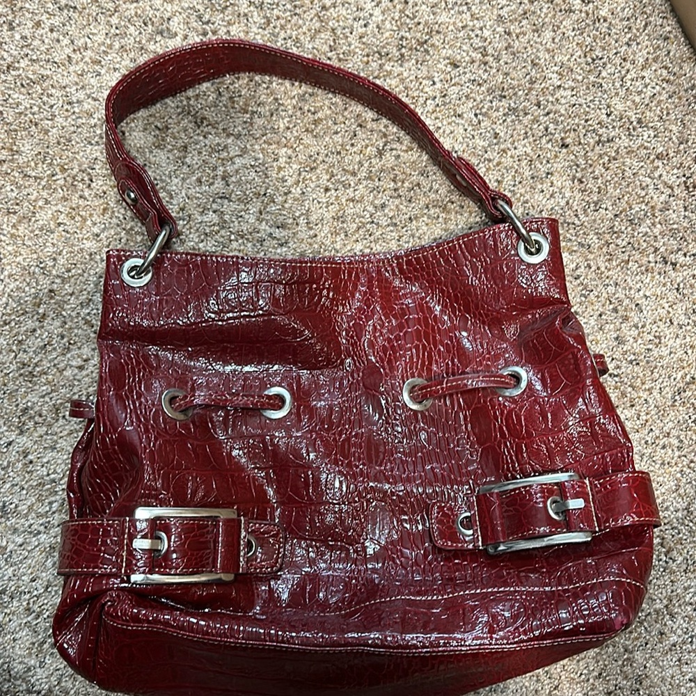 Red, shiny , purse